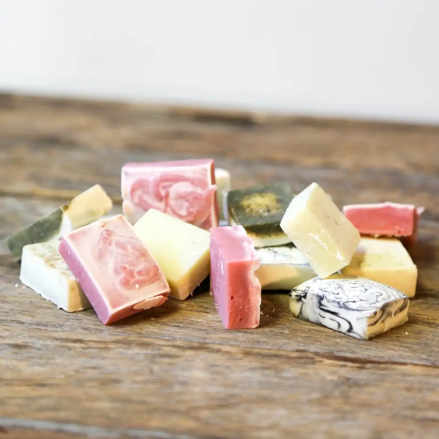 Assorted colorful soap bars.