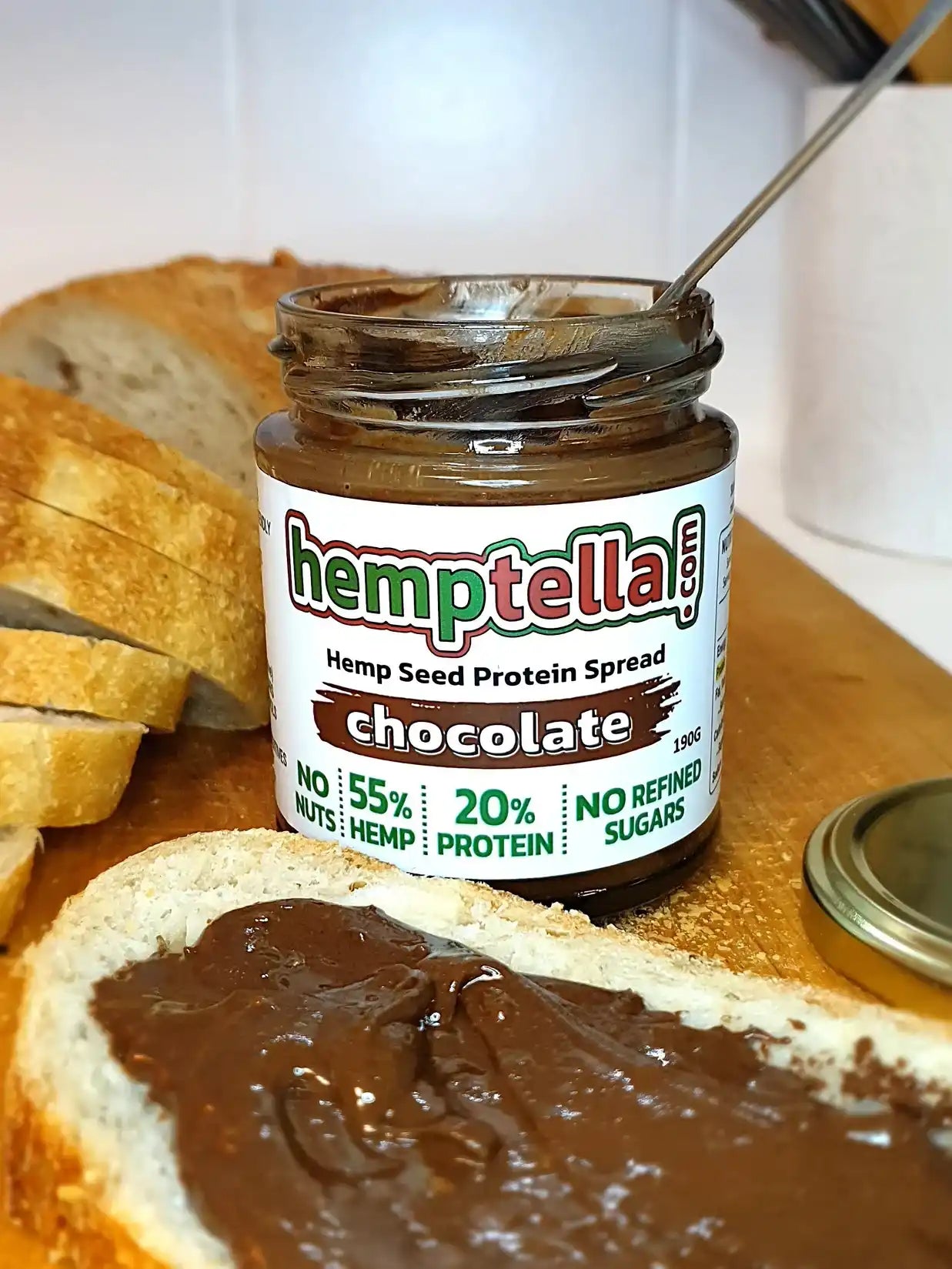 Jar of chocolate hemp seed protein spread.