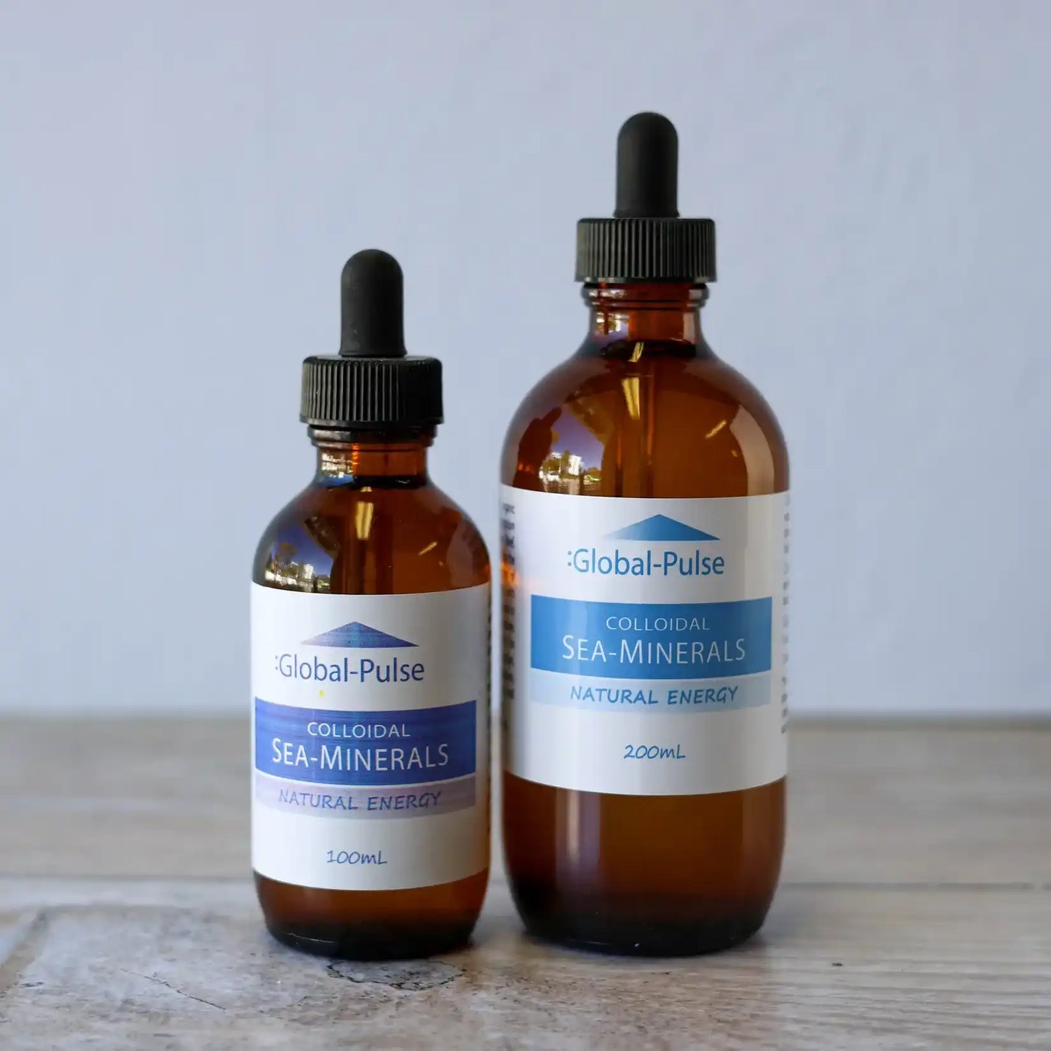 Two brown bottles of colloidal sea minerals.